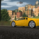 Screenshot of a yellow supercar on a road in World Racing 2: Champion Edition.